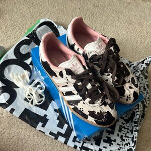 NWT ASOS exclusive cow print sambas